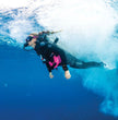 Scubapro Luna 2.0 AI Dive Computer on a scuba diver diving underwater