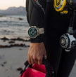 Suunto Ocean Steel Black dive computer with GPS on a diver