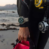 Suunto Ocean Steel Black dive computer with GPS on a diver