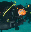 OMS Tattoo Mask orange on diver
